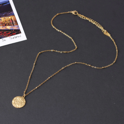 Carved Gold Coin Pendant