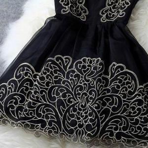 Pure Elegance Black And Gold Sleeveless Lace Party..