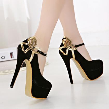 black high heels with gold ankle strap