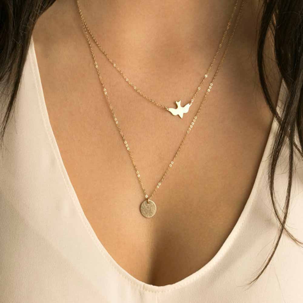 Gold Charmed Swallow Necklace